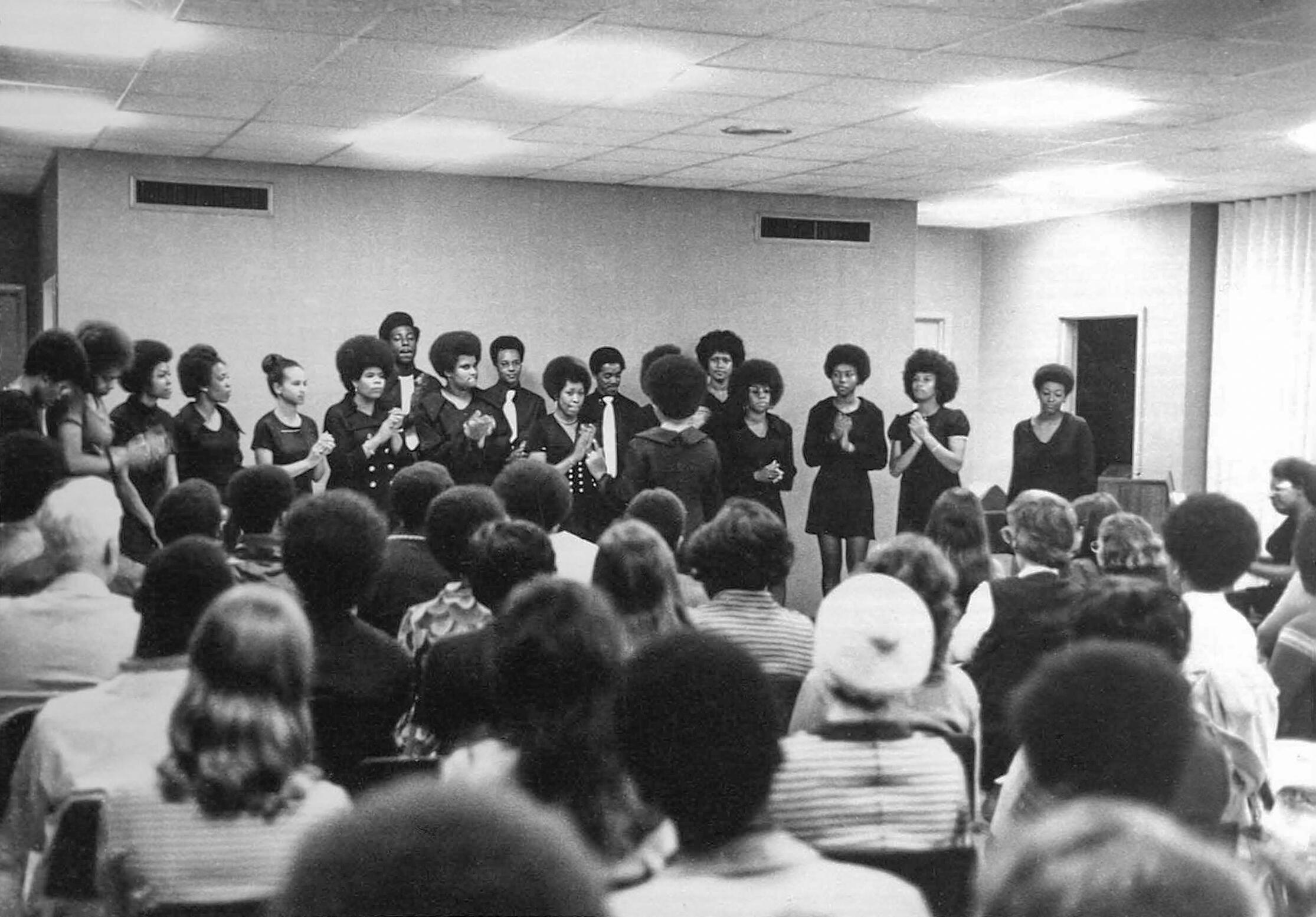 The Black Awakening Choir sings in front of a large audience in 1971.