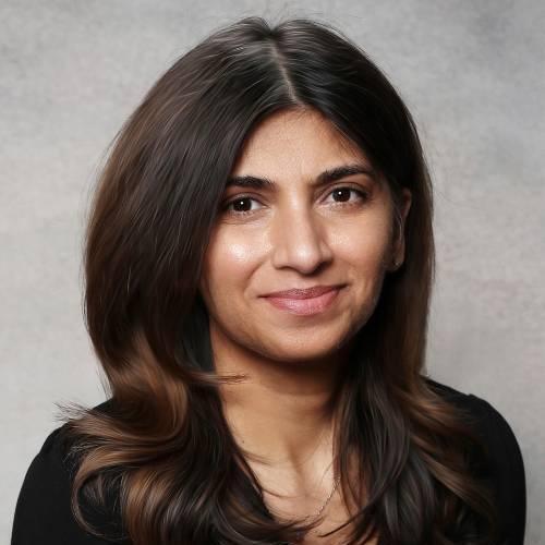 A photo of a woman from the shoulders up. 