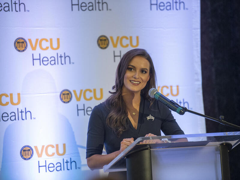 Camille Schrier speaking at an event.