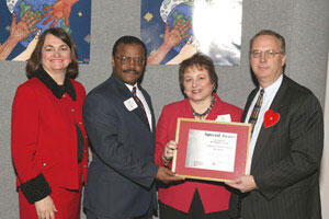 Sara Wilson, director, State Department of Human Resource Management (left), presents VCU representatives Michael Ford, University News Services, VCU CVC vice-chair, and Linda Tillman, Human Resource Division and VCU CVC co-chair, with a CVC Special Award for 2003. At right is Bill Leighty, chief of staff to Gov. Mark Warner and keynote speaker for the annual CVC awards luncheon.

Photo courtesy of Virginia Department of Human Resource Management