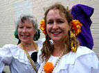 From left: Trish Nunley and Jacqueline Meyer of La Mezcla Que Baila get ready to perform on the festival stage. The group is known for its traditional Flamenco and Mexican dances.