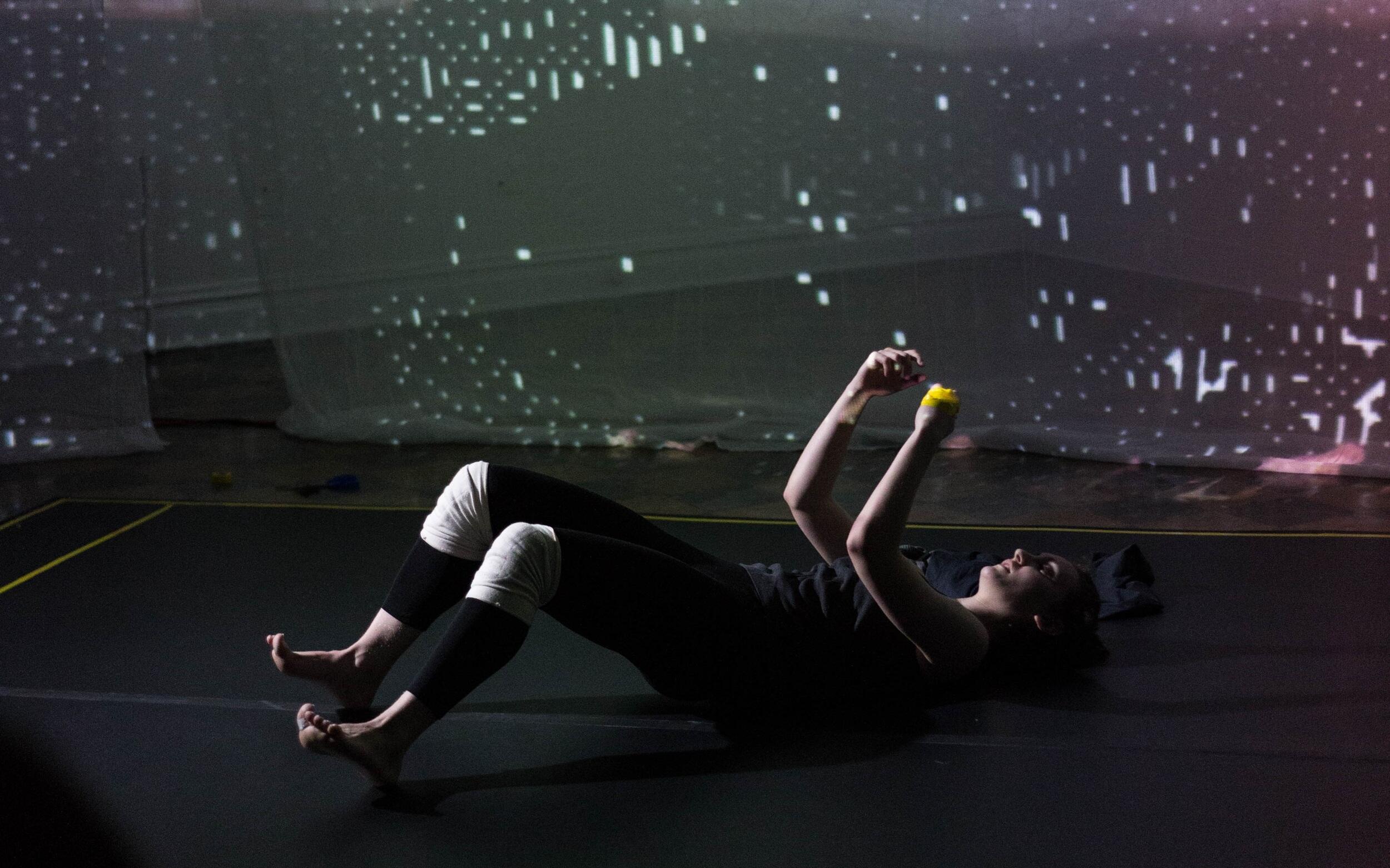 Hallie Chametzky performs \"22 Percent: A Disintegrating Data Visualization.\"