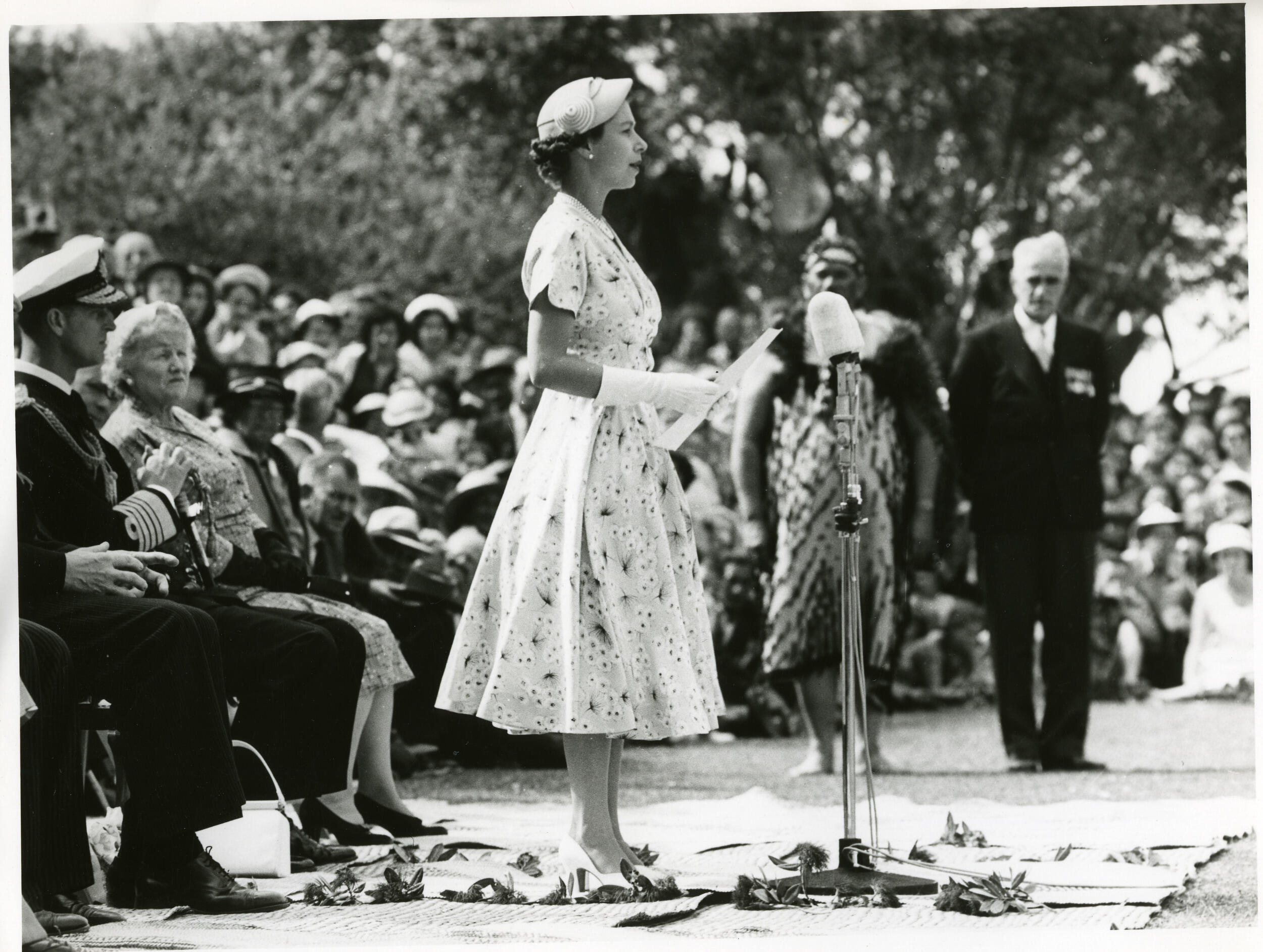 Queen Elizabeth II stands and speaks at a public event in New Zealand.